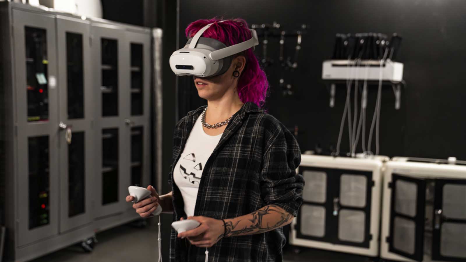 Student working with a VR headset on