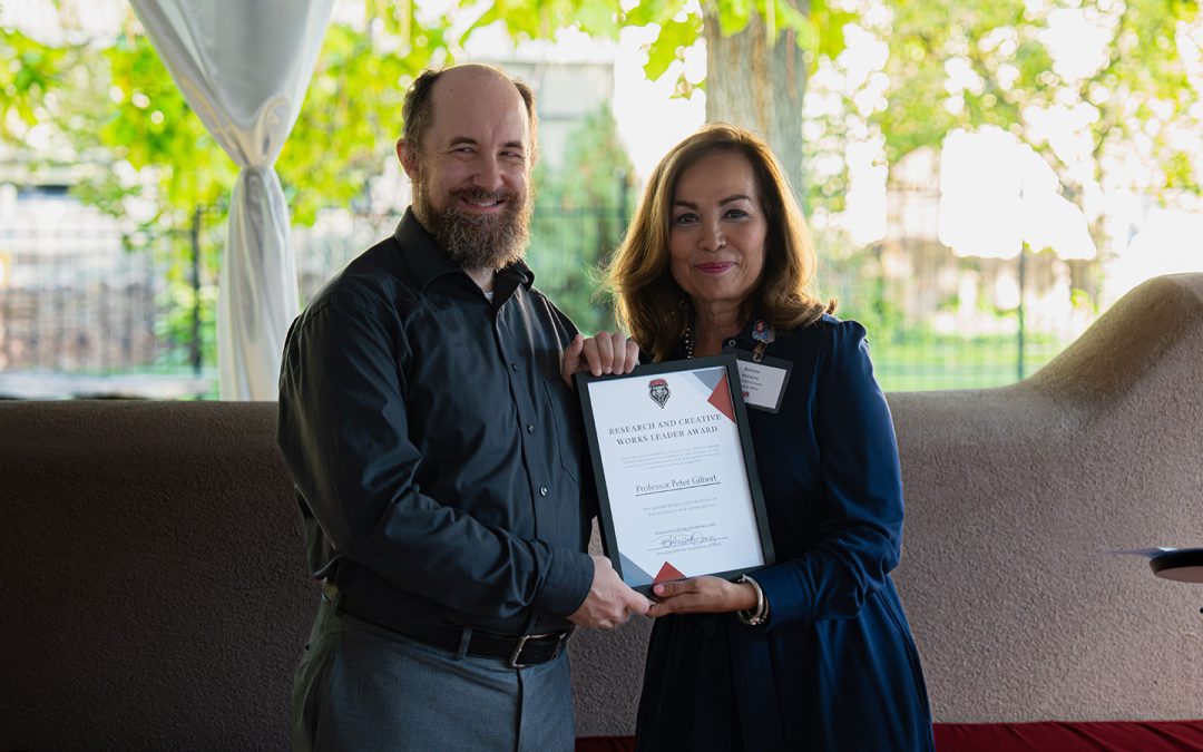 Dr. Peter Gilbert Honored with UNM Research and Creative Works Leadership Award